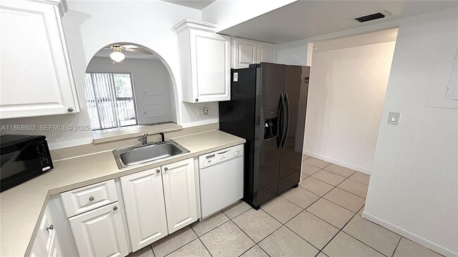 property at 711 N Pine Island Rd