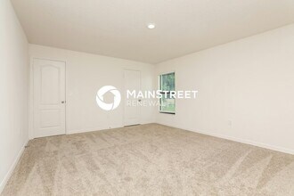 35665 Rose Moss Ave in Leesburg, FL - Foto de edificio - Building Photo