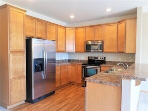 11898 Emery Village Dr N in Champlin, MN - Building Photo - Building Photo
