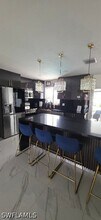 1118 NE Pine Island Ln in Cape Coral, FL - Building Photo - Building Photo