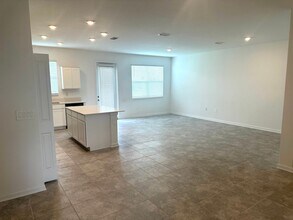9042 MULLIGAN ISLAND Ln in Davenport, FL - Building Photo - Building Photo