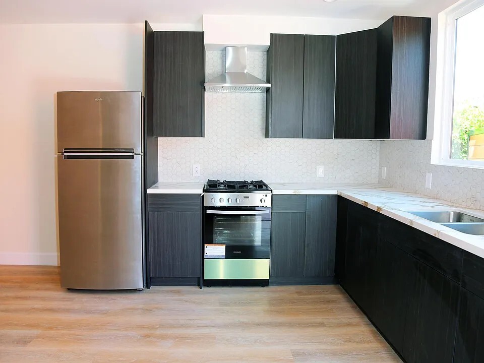 6919 De Longpre Ave, Unit 1 in Los Angeles, CA - Foto de edificio