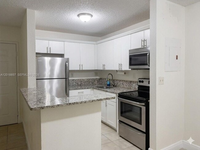 property at 7115 NW 179th St