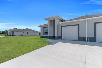 732 Jack Ave S in Lehigh Acres, FL - Building Photo - Building Photo