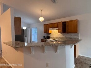 1064 Helena Ave NW in Palm Bay, FL - Building Photo - Building Photo