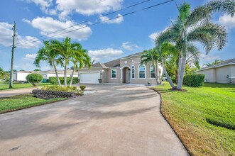 1230 SW Ermine Ave in Port St. Lucie, FL - Building Photo - Building Photo