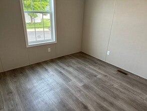 506 English Oak Ct in Whittaker, MI - Building Photo - Building Photo