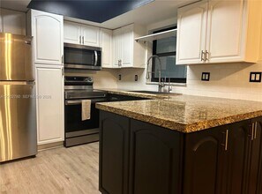 10 Laredo Pl in Davie, FL - Building Photo - Building Photo