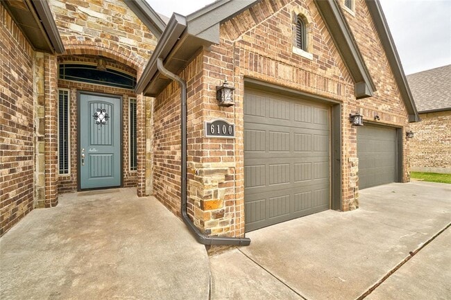 property at 6100 NW 154th St