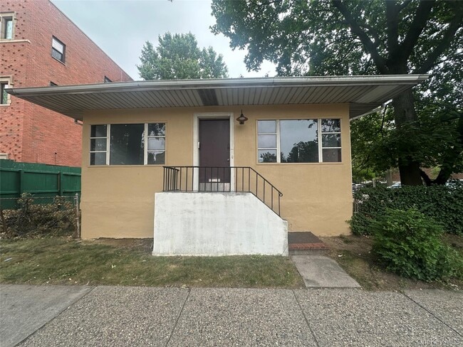 property at 77-43 Main St
