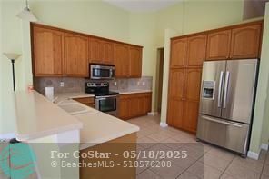 12459 NW 52nd Ct in Coral Springs, FL - Foto de edificio - Building Photo