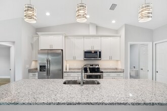 825 Haleybury St NW in Port Charlotte, FL - Building Photo - Building Photo