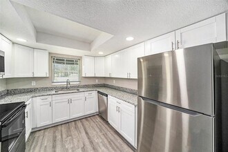 11911 Pine Forest Dr in New Port Richey, FL - Building Photo - Building Photo