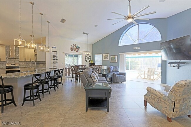 1579 Whispering Oaks Cir in Naples, FL - Building Photo - Building Photo