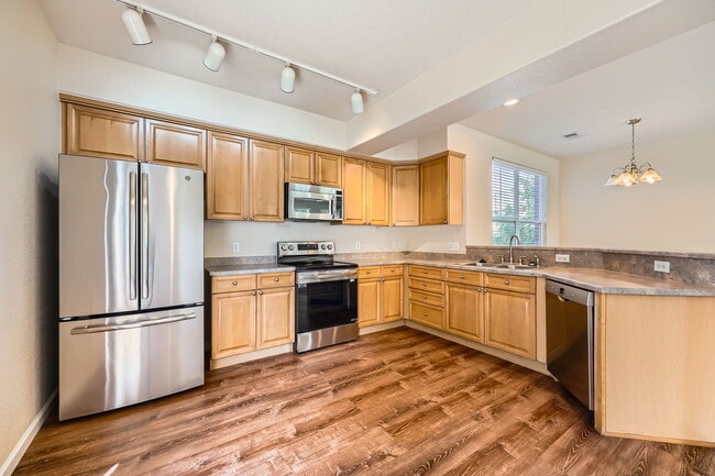 2230 S. Vaughn Way. Unit 104. in Aurora, CO - Building Photo - Building Photo