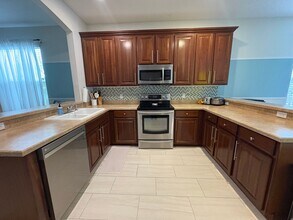 6907 Beargrass Rd in Harmony, FL - Building Photo - Building Photo