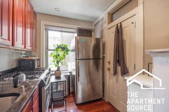 544 W Surf St, Unit E1 in Chicago, IL - Building Photo - Building Photo