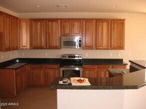 14088 W Aster Dr in Surprise, AZ - Building Photo - Building Photo