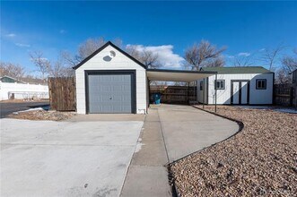6446 Monaco St in Commerce City, CO - Building Photo - Building Photo