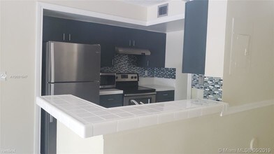 15201 SW 80th St-Unit -Apt 103 in Miami, FL - Building Photo - Building Photo