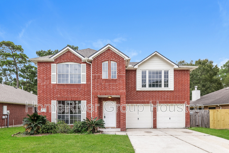 21851 Whispering Forest Dr in Kingwood, TX - Foto de edificio