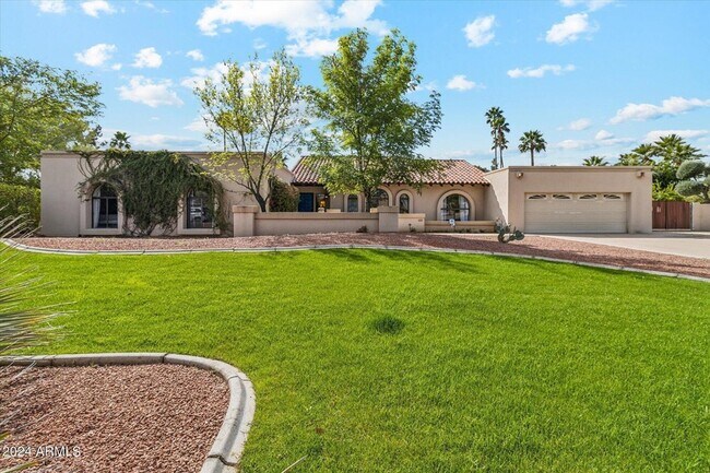 property at 7363 E Paradise Dr