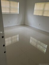 1451 NE 170th St-Unit -101A in North Miami Beach, FL - Building Photo - Building Photo