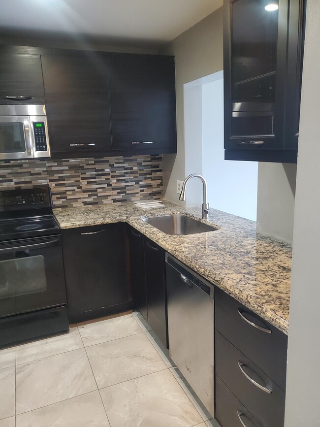 property at 7410 Woodmont Terrace