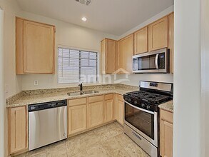 14223 W Country Gables Dr in Surprise, AZ - Building Photo - Building Photo