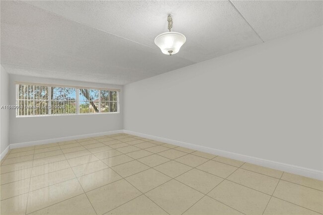 property at 6135 NW 186th St