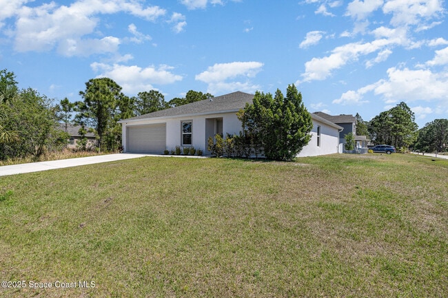 2359 Fallkirk Ave in Palm Bay, FL - Building Photo - Building Photo
