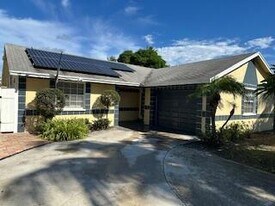 7250 San Castle Blvd in Lantana, FL - Building Photo