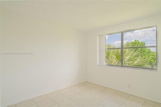 9033 Wiles Rd in Coral Springs, FL - Building Photo - Building Photo