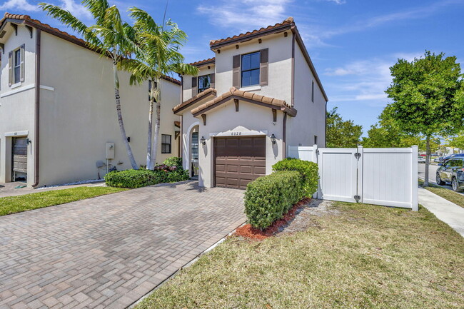 property at 6028 Pine Tree Way
