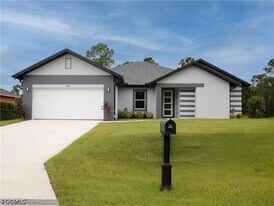 1228 Chrisholm St in Lehigh Acres, FL - Building Photo