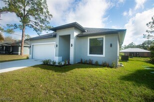 1087 Rugby Cir in Fort Denaud, FL - Building Photo