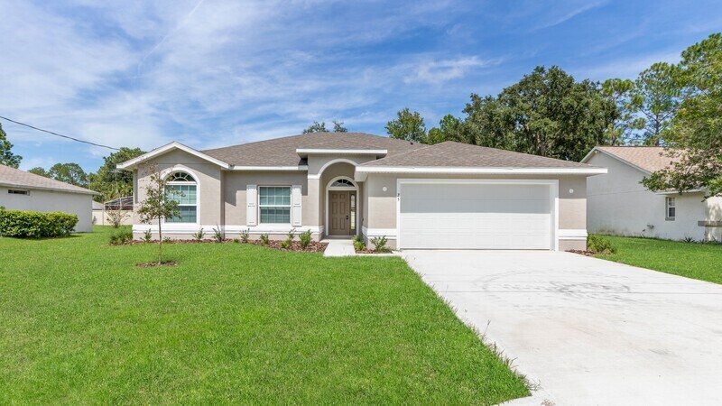 25 Pine Cottage Ln in Palm Coast, FL - Building Photo