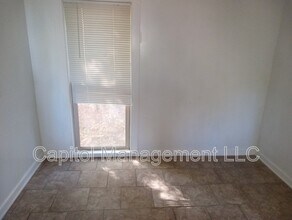 1126 Seymour Ave in Lansing, MI - Building Photo - Building Photo