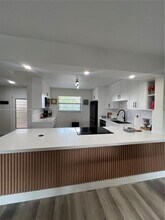 4950 E Sabal Palm Blvd in Tamarac, FL - Building Photo - Building Photo
