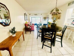 10245 NW 9th St Cir, Unit 104-9 in Miami, FL - Building Photo - Building Photo