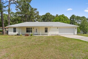 9270 Quail Roost Dr in Navarre, FL - Building Photo
