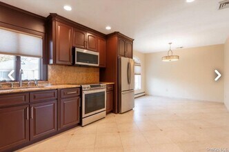 171 Roslyn Rd in Mineola, NY - Building Photo - Building Photo