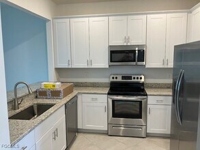 14162 Pine Lodge Ln in Miromar Lakes, FL - Building Photo - Building Photo