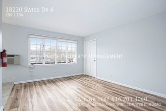18230 Swiss Dr in Spring Lake, MI - Building Photo - Building Photo