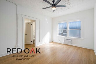 719 Heliotrope Dr, Unit 203 in Los Angeles, CA - Foto de edificio - Building Photo