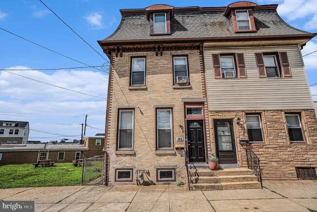 property at 103 E 4th St