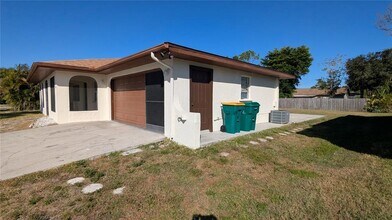 874 Dolphin Ave NW in Port Charlotte, FL - Building Photo - Building Photo