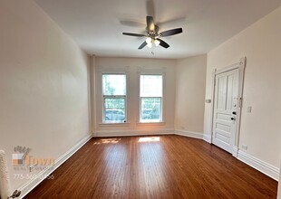 6689 N Olmsted Ave, Unit 1F in Chicago, IL - Building Photo - Building Photo