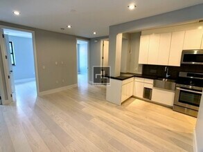 Stanton Street, Unit 6G in New York, NY - Building Photo - Building Photo