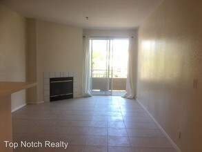 3969 Mahaila Ave-Unit -Unit 107 in San Diego, CA - Building Photo - Building Photo